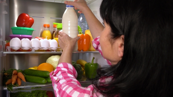 Woman Drinking Milk From a Glass