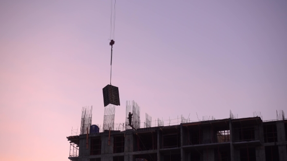 Crane Works at Construction Site