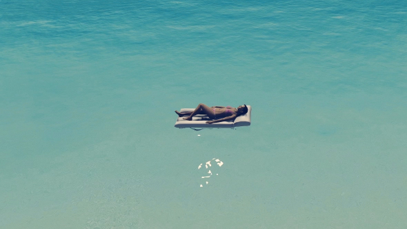 Beautiful Woman On Air Bed alt