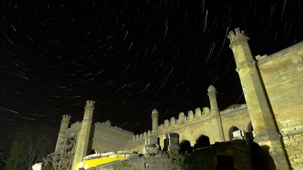 Star Trails Over Scenic Abandoned Ruin of Building alt