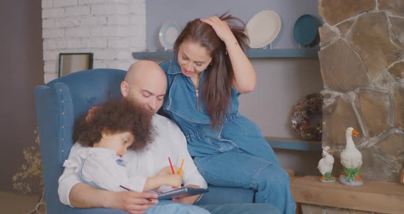 Happy father and mom are playing with his little daughter Turkish family Happy family alt