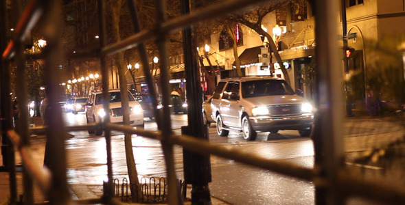 Cars Driving Down City Street At Night 5