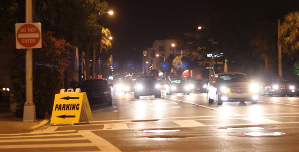 Cars Driving Down City Street At Night 6