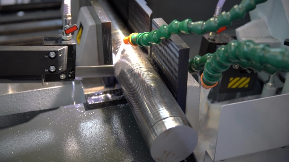 Modern Machine Saw. Cutting Metal Modern Processing Technology. alt