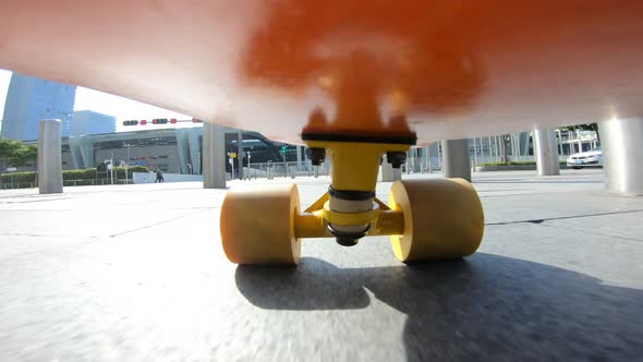 People skateboarding on road point of view alt