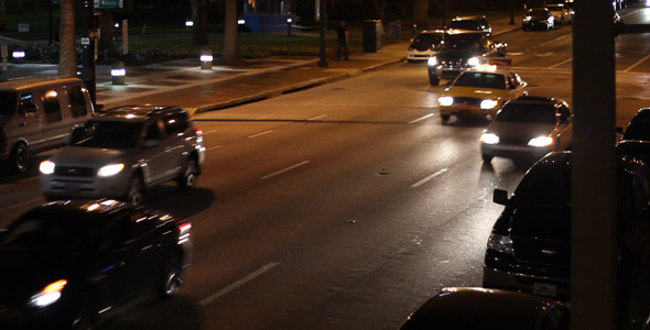 Cars Driving Down City Street At Night 7