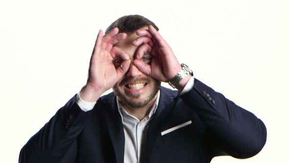 Man Fools Around and Makes Funny Faces. , White Background alt