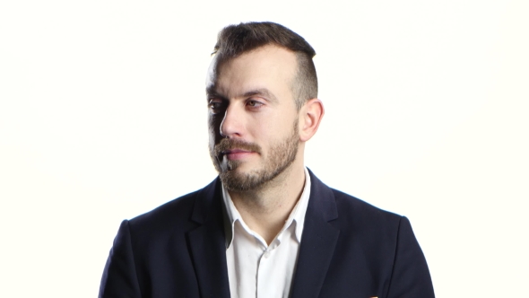 Man Looks Around with Interest and at the End Smiles alt