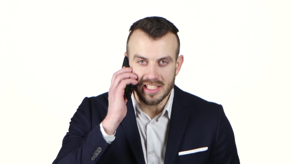 Man Exasperated Talking on Cell Phone and Screaming. White Background alt