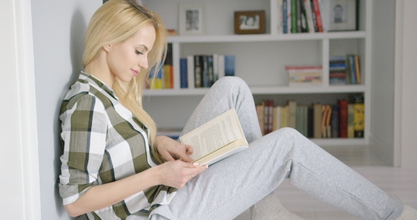 Lovely Female Reading at Home alt