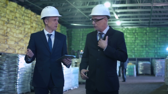 The Specialists Talking in Warehouse alt