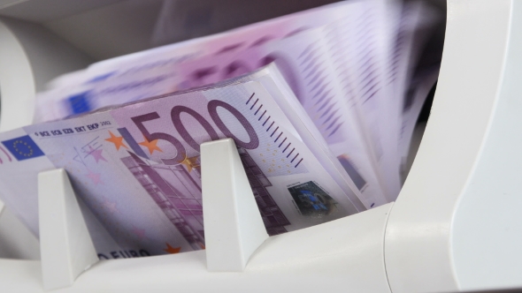 Cash Money Counting Machine. Banknote Counter Are Counting Five Hundred Euro Bills. alt