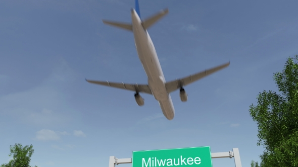 Airplane Arriving To Milwaukee Airport Travelling To United States alt