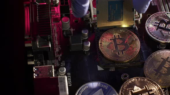 Bitcoin BTC Ethereum Coins on Digital Computer Motherboard Cryptocurrency Mining Cashless Future alt