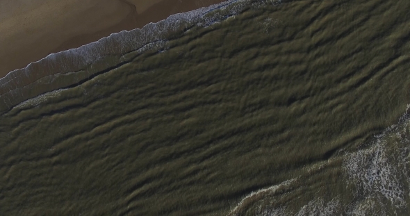 Aerial Drone  Footage of Ocean Waves Reaching Shore