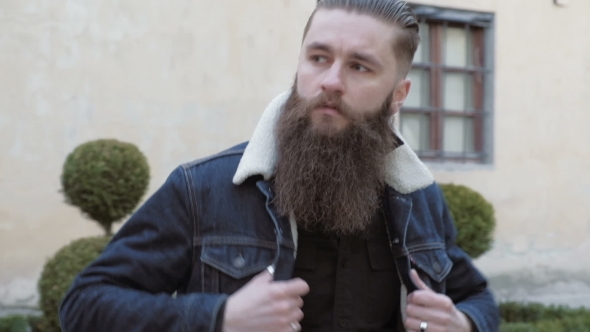 VideoHive Portrait of Bearded Male with Long Hair Dressed in a Denim Jacket 19755832 VideoHive Portrait of Bearded Male with Long Hair Dressed in a Denim Jacket 19755832