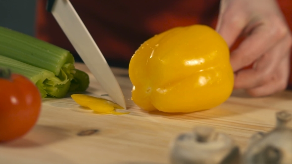 The Cook Cuts Bell Peppers