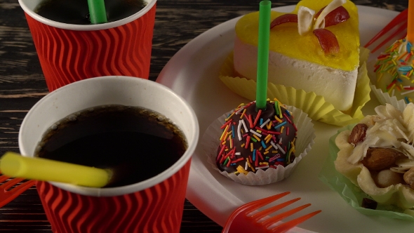 Delicious Cupcakes with Drinks.