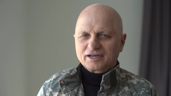 Headshot of Aged Caucasian Military Man Indoors