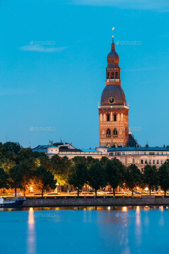 Riga Latvia. Tower Of Riga Dome Cathedral In Evening Illuminatio - Stock Photo - Images