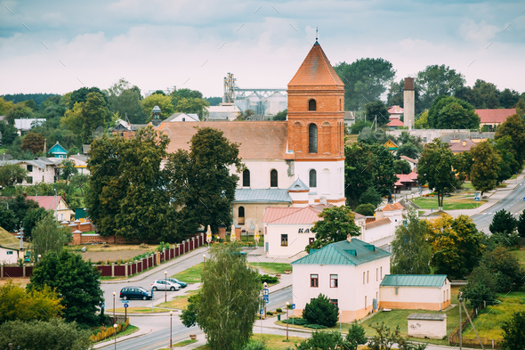 Mir, Belarus. Landscape Of Village Houses And Saint Nicolas Roma - Stock Photo - Images