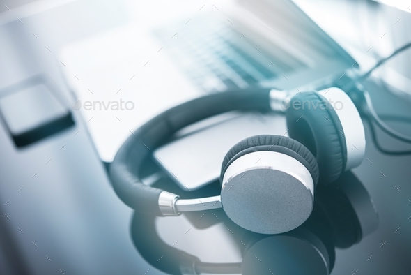 Headphones and the Computer - Stock Photo - Images
