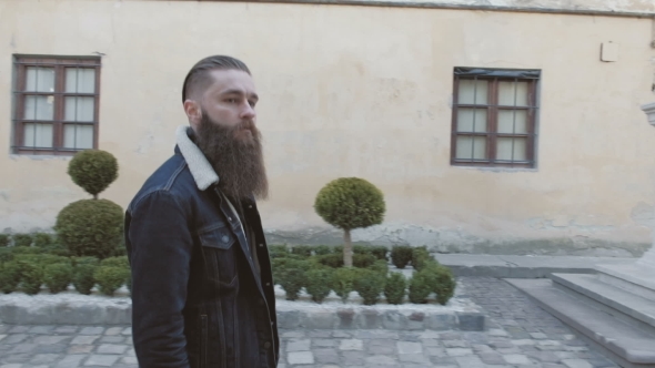 VideoHive Handsome Bearded Man Posing in the Street Brutal Hipster Portrait 19784257 VideoHive Handsome Bearded Man Posing in the Street Brutal Hipster Portrait 19784257