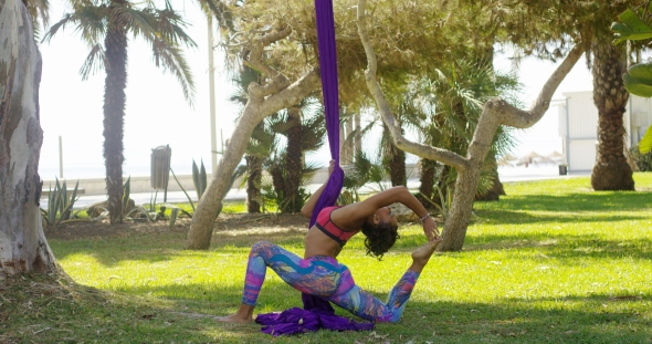 Young Gymnast Working Out with Ribbons alt
