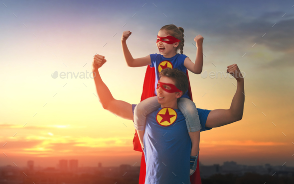 Dad and his daughter playing outdoors - Stock Photo - Images