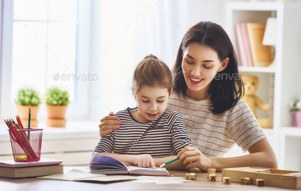 Mom and child reading a book