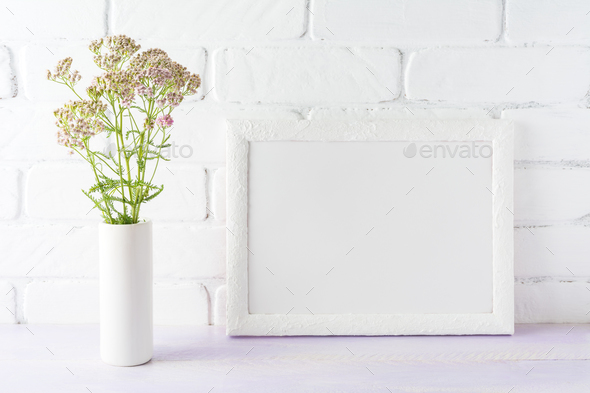 White landscape frame mockup creamy pink flowers in cylinder vas - Stock Photo - Images