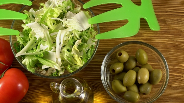 Vegetables Ingridients for Salad on Rustic Wooden Background.