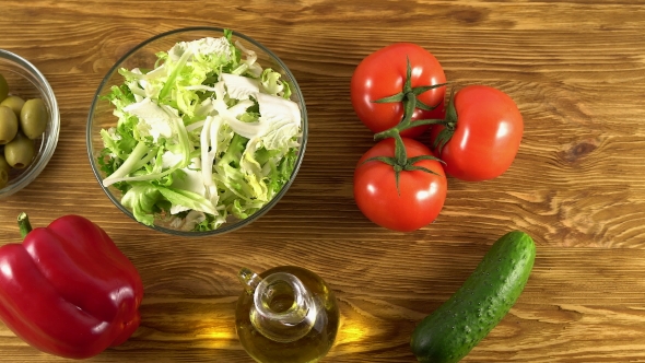 Vegetables Ingridients for Salad on Rustic Wooden Background.