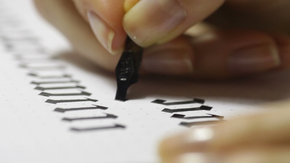 Woman Writes Pen with Calligraphic Letters