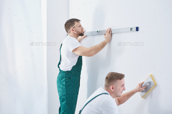 Men And Home Renovation Stock Photo By Bialasiewicz Photodune