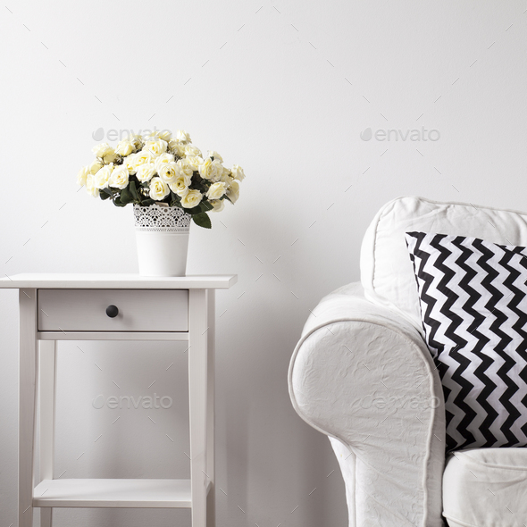 Wooden etagere and white sofa - Stock Photo - Images