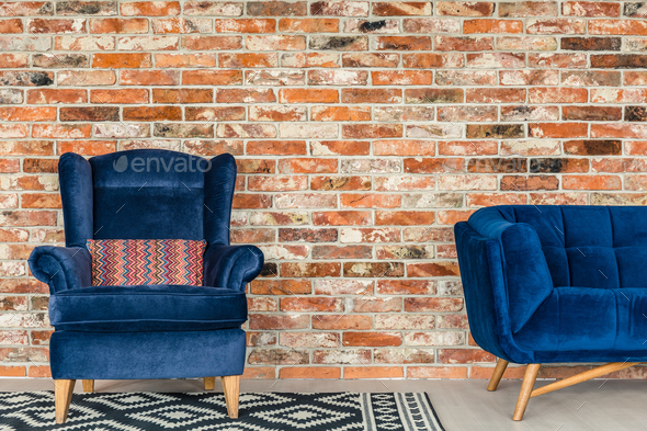 Blue upholstered armchair - Stock Photo - Images