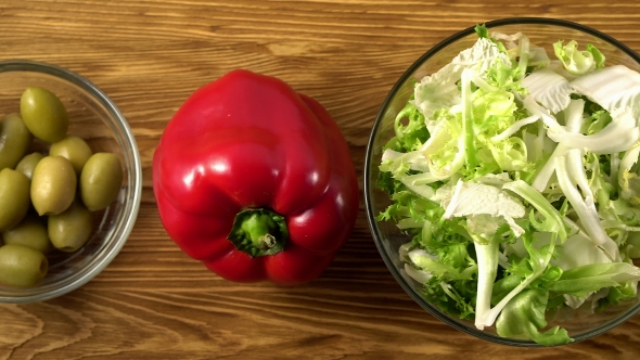 Vegetables Ingridients for Salad on Rustic Wooden Background.