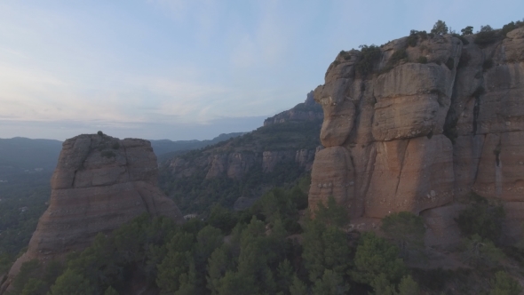 Flying Over Rock Peaks at Dusk alt