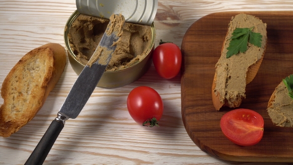 Fresh Pate with Bread on Wooden Table