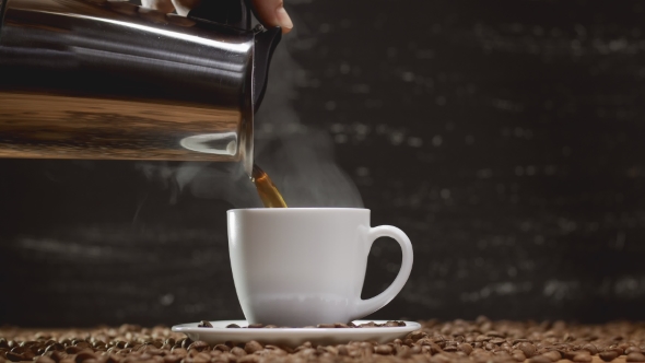 Pouring Coffee From Pot In White Cup Surrounded By Pouring Coffee From Pot In White Cup Surrounded By