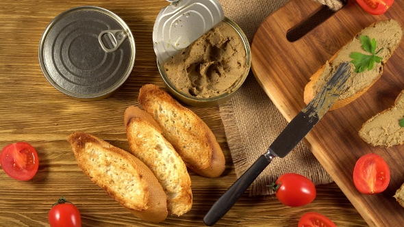 Fresh Pate with Bread on Wooden Table