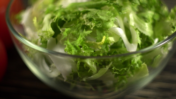 Vegetables Ingridients for Salad on Rustic Wooden Background.