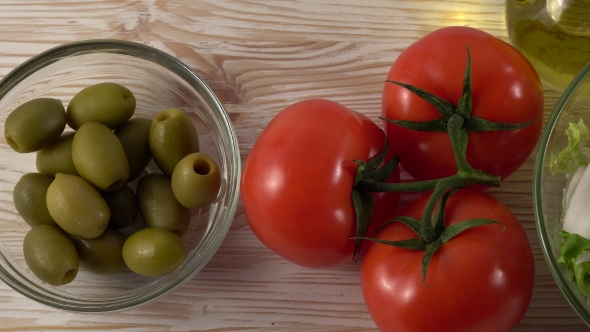 Vegetables Ingridients for Salad on Rustic Wooden Background.