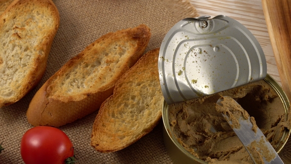 Fresh Pate with Bread on Wooden Table