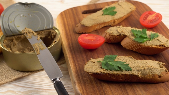 Fresh Pate with Bread on Wooden Table