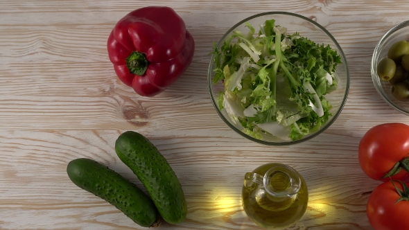 Vegetables Ingridients for Salad on Rustic Wooden Background.