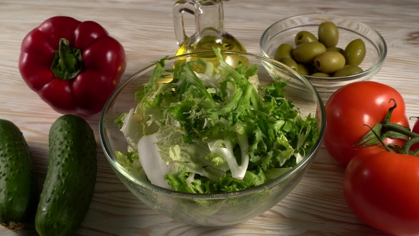 Vegetables Ingridients for Salad on Rustic Wooden Background.