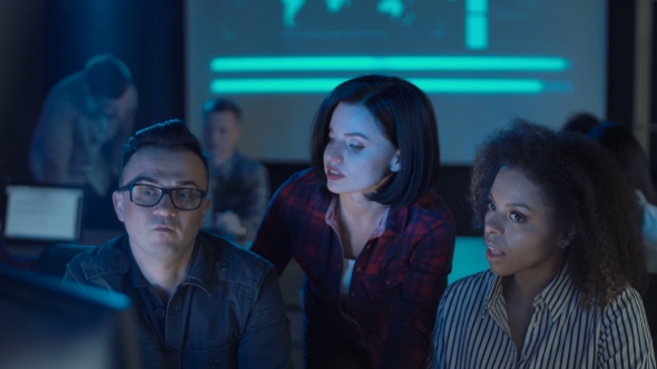 People Talking at Computer in Office alt