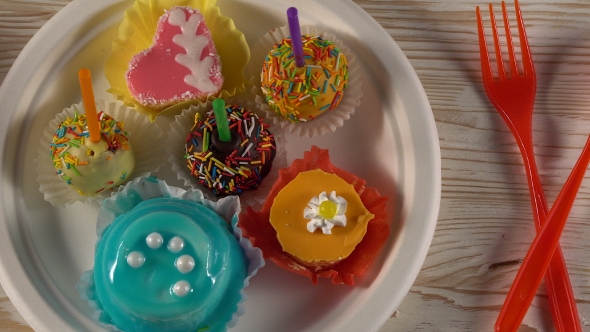 Delicious Colourful Cup Cakes.